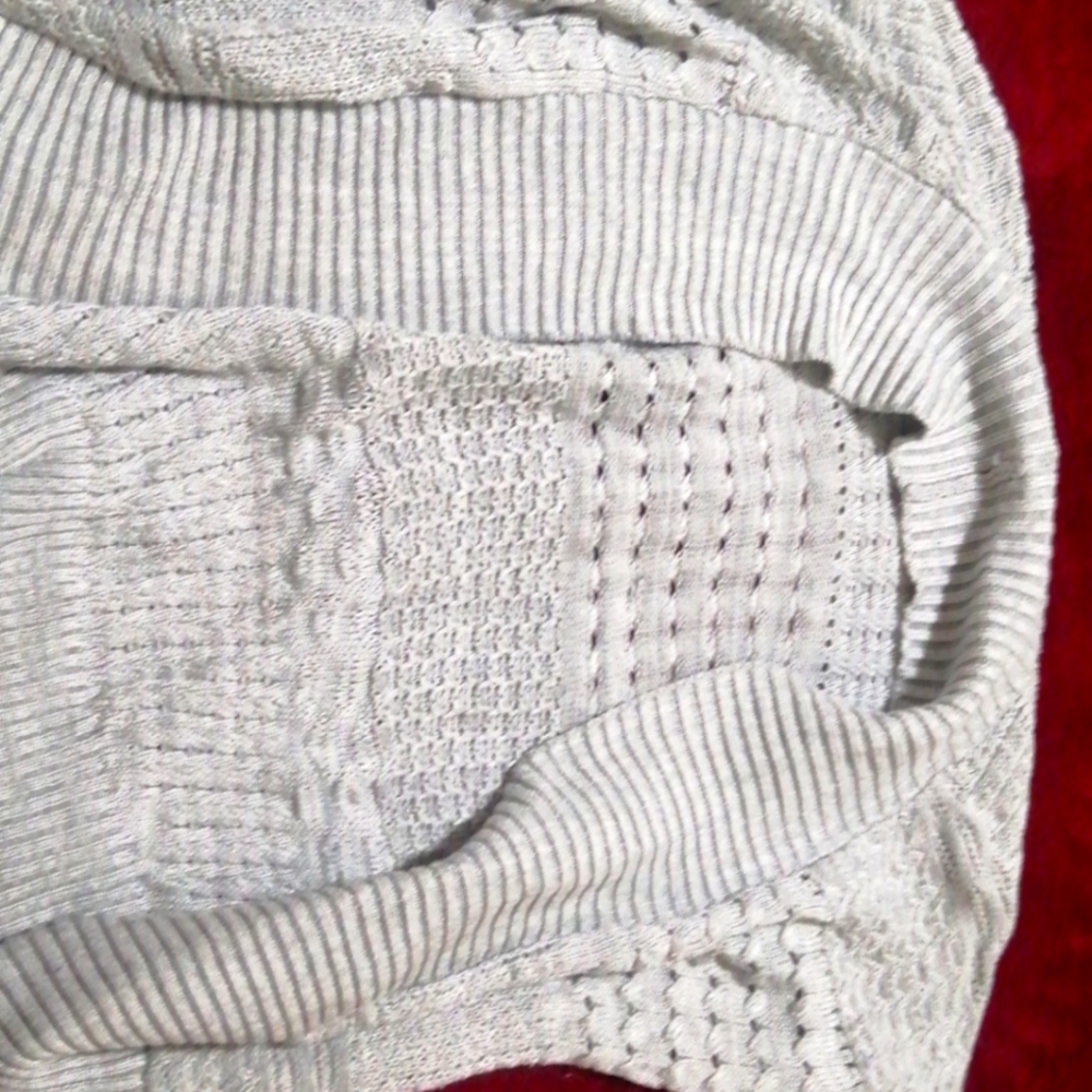 I'm selling this grey blouse